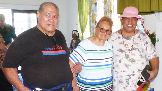 Rachael Mitchell of Fagatogo (center) 