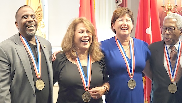 CW4(R) Hope L. Jamias-Bean (second from left) and fellow inductees