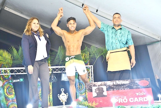 Local bodybuilder Frank Asi Tuisalega receives his trophy
