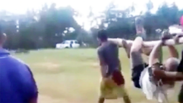 Screenshot of the elderly man who was hog-tied and