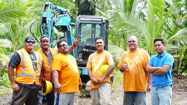 Happy Trucking workers pose for Samoa News photo
