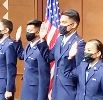 Deon Lesatele Alaimaleata and others being sworn in as Airforce ROTC officers 