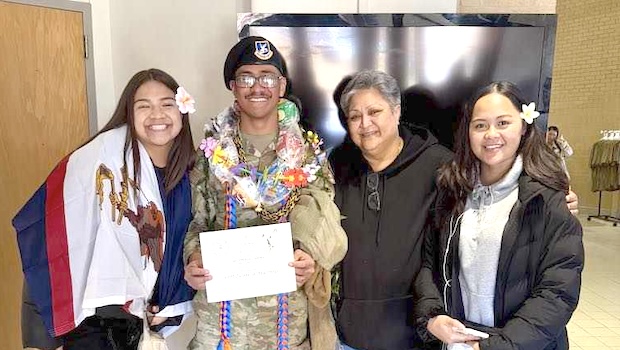Airman First Class Vincent M.J. Laupola and family