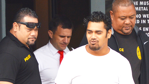 Detectives of the DPS Vice & Narcotics Units escort Alapati Vaivai out of District Court 