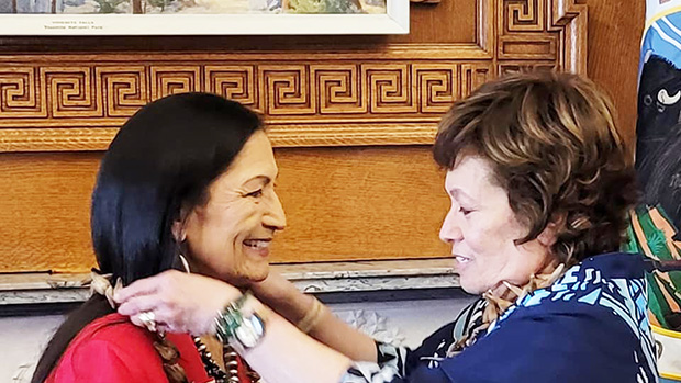 Congresswoman Uifa’atali Amata presents an ula fala to her former House colleague, new Secretary of the Interior Deb Haaland