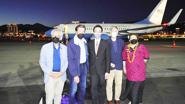Alan Lowenthal from California, Democratic House members John Garamendi, Donald Yu-Tien Hsu, Director-General, dept. of North American Affairs, Taiwan's Ministry of Foreign Affairs, Democratic House member Don Beyer from Virginia and Republican Rep. Aumua Amata Coleman Radewagen, delegate from American Samoa pose for a photo after arriving on a U.S. government plane at Songshan airport in Taipei.