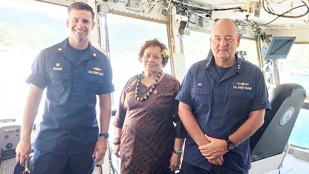 Amata with Admiral Michael Day and Lt. Commander Timothy Bonner.