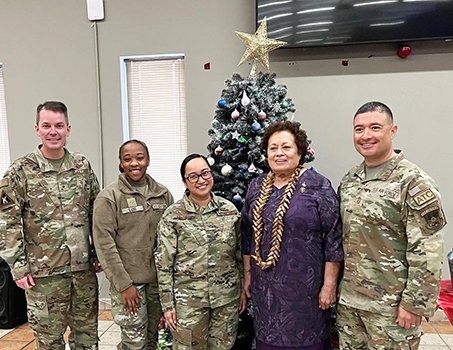 Amata with Agueda Vaiola Leleua and other service members