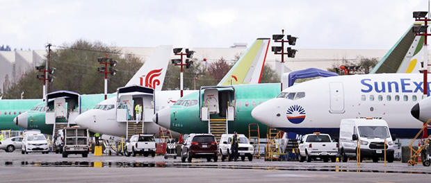 Planes lined up on tarmac