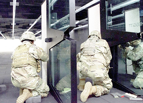 Soldiers firing weapons in the U.S. Army Reserve's first Modular Small Arms Range in Pago Pago, American Samoa, April 27, 2019.