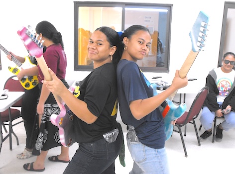 Two students in the STEAM Guitar Building Program