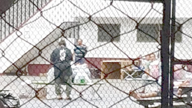 People inside an ASCC coronavirus quarantine site.