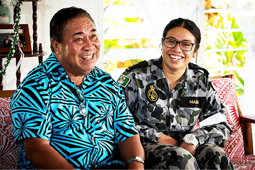 Able Seaman Boatswains Mate, Natasha Mailei visits her grandfather, Asi Mailei, in the village of Tuana'i in Samoa.