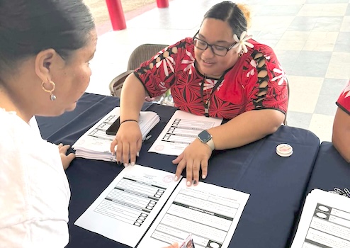 election offficial explaining the ballot