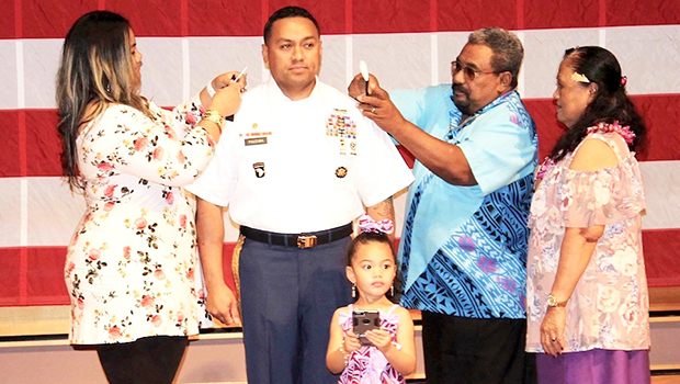 Sgt Major Pousima with family