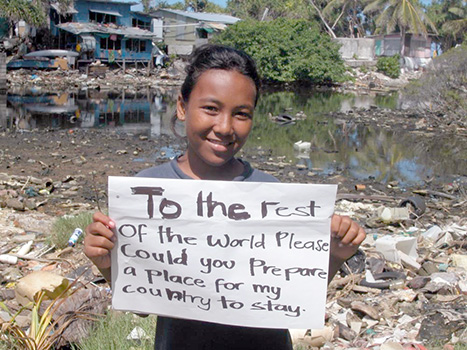 A child in Tuvalu asks the rest of the world to please find a place for her country.