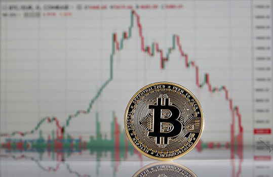 Bitcoin displayed in front of a price chart on the website of cryptocurrency exchange Coinbase earlier this year.