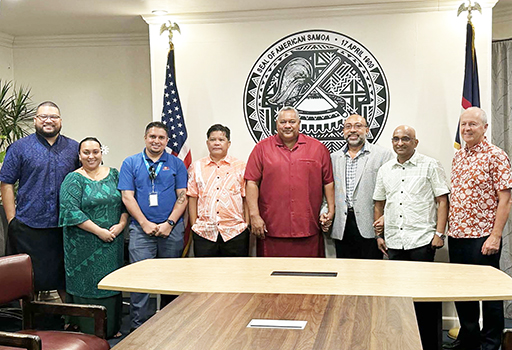 Gov. Lemanu P.S. Mauga and ASG staffers in a group photo with personnel from Bluesky and its parent company