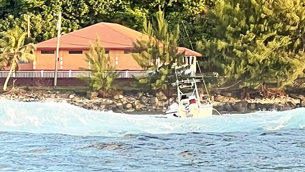 Fishing boat aground in Pago harbor