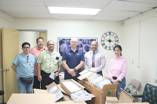 boxes of glasses with lbj staff and doner