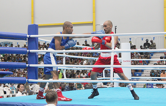  Losifafo Tunoa battling it out with Tongan opponent