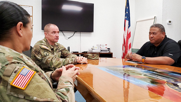 rig. Gen. Timothy Connelly and Command Sgt. Maj. Jessie Baird with Timothy Faumuina
