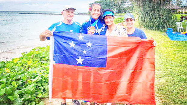 Anne Cairns with her family who joined her in Samoa