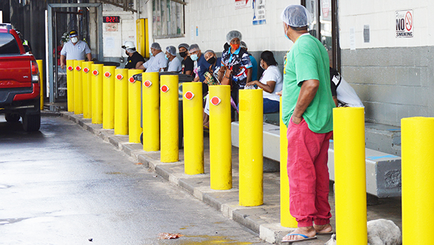 Cannery workers waiting for their paychecks