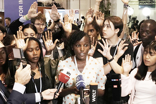 Climate activist Vanessa Nakate, of Uganda with others at cop27