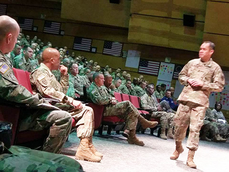 Retired Command Sergeant Major Charles Tobin (standing, right) 