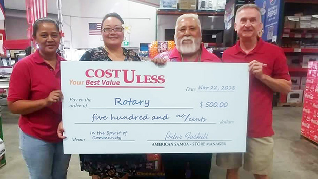 Cost U Less general manager Pete Foskitt with Rotary Club members