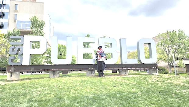 Darius McMoore in front of CSU sign