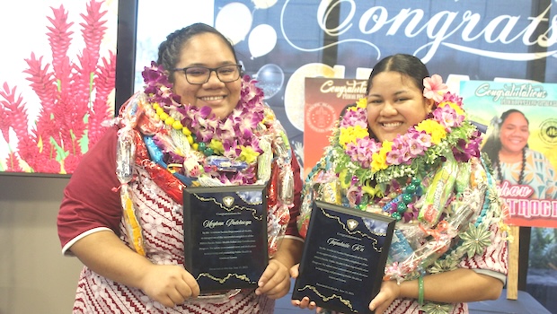 graduates Meghan & Taputailo