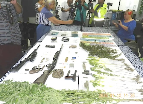 drugs, firearms, ammunition, and cash