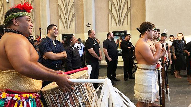 Scores of Polynesian dancers welcome Momoa