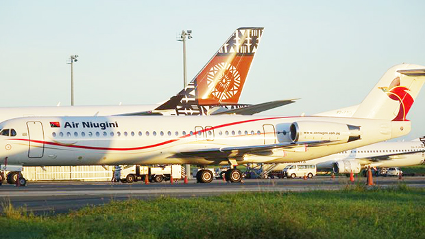  Air Niugini and Fiji Airways parked at Nadi International Airport 