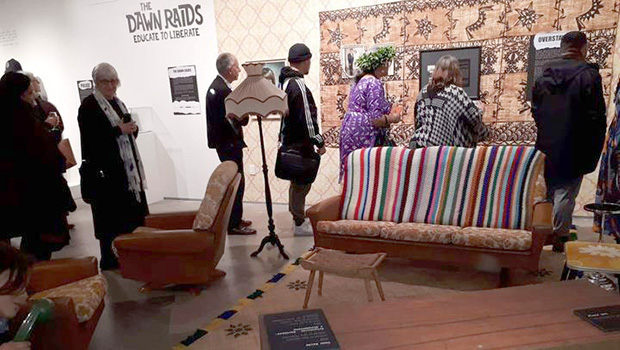 People file through the replica 1970s lounge at the exhibition