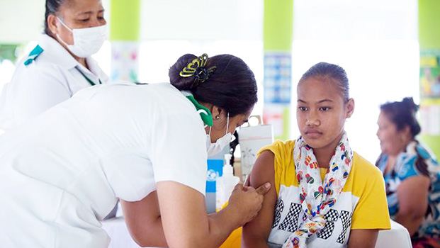 A girl receiving a vaccine