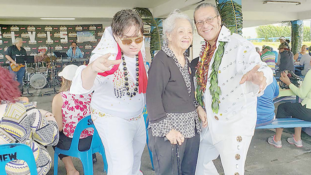 Mrs. Vera Annesley (center) and two of the several Elvis impersonators that were hosts at the event —(left) Joey Cummings of KHJ Radio and (right) Tui Letuli, a board member of both SMF and SJAAS