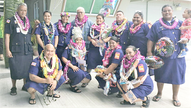 The 11 graduates and EMS head Popo Avegalio