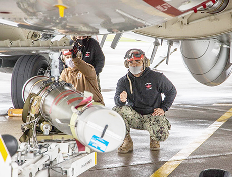 Evan Tu’ua from Maleimi, AS (right), Ryan Ward, center, and Mason Cleveland