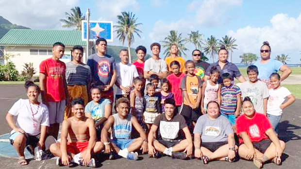 Young people of Fagaalu village in a group photo