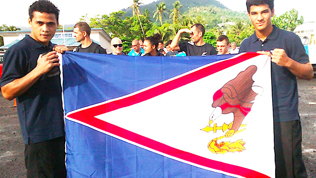 Two local fighters representing American Samoa during the 2018 Oceania Youth Boxing Championships, which was also a Qualifier Championship for the Youth Olympics Games in Argentina this year, Falaniko Tauta and Jolando Taalo, posing with the American Samoa flag.