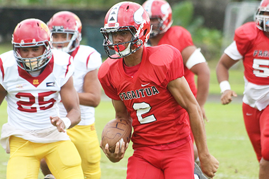 Faga’itua Vikings quarterback Fitu Amata Jr. breaking