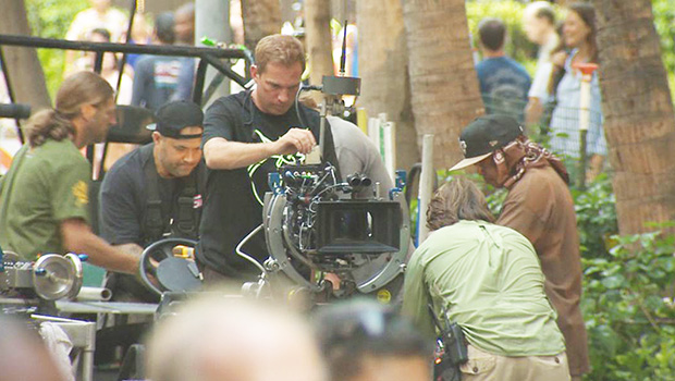 A film crew working on the streets of Honolulu
