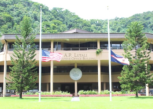 FLAGS AT HALF- STAFF