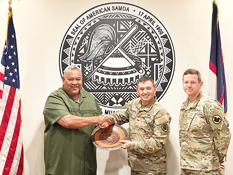 Gov. Lemanu P.S. Mauga presented traditional gifts to IRT mission