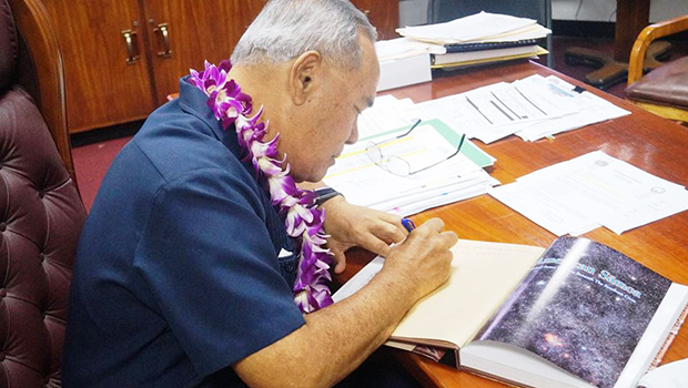 Governor signs new edition of Centennial Book 