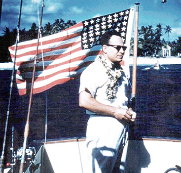 Gov. Tali Peter T. Coleman with a 48-star U.S. flag 
