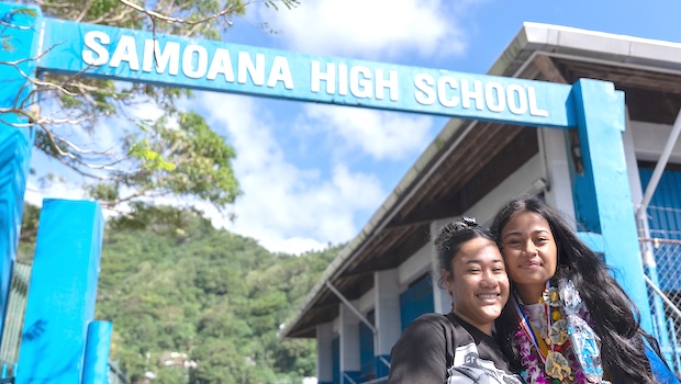 Two Samoan HS graduates